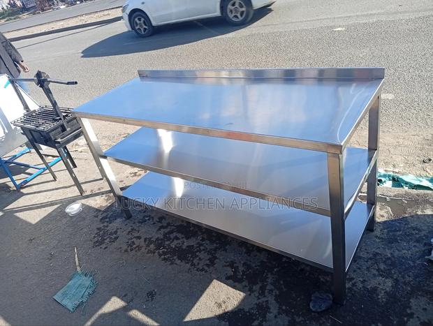 Stainless Steel Heavy Duty Working Top With Under Shelves.