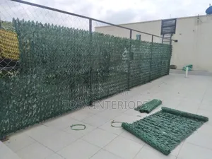 Artificial Privacy Hedges for Trapping Dust on Home Garden