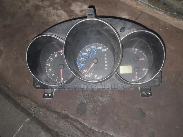Mazda Axela Dashboard Clock/ Odometer