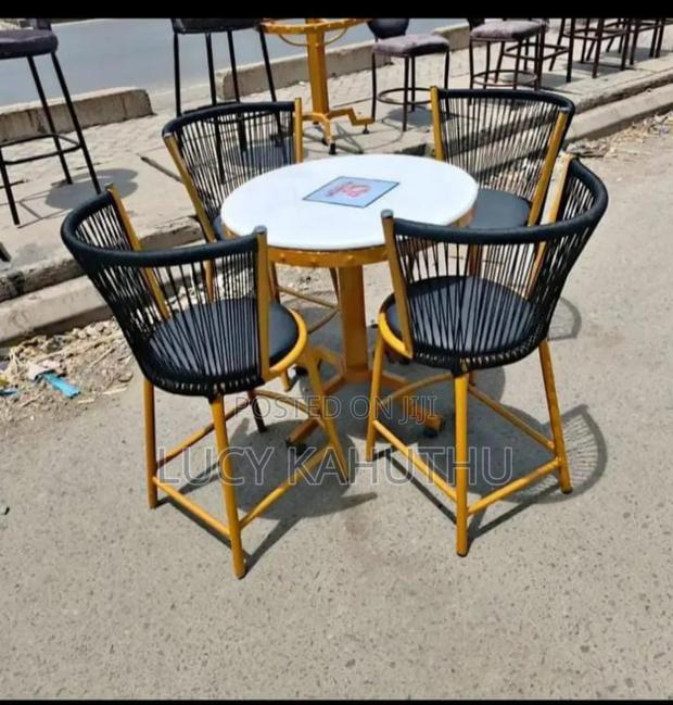 Woven Chairs With Powder Coated Marble Table
