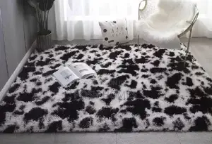 Patched Black and White Fluffy Carpet