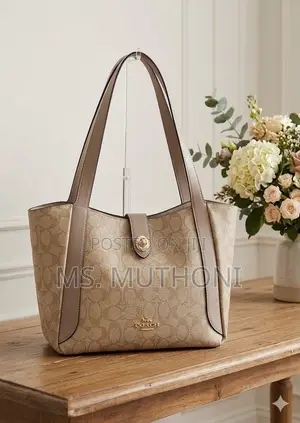Coach Hadley Turnlock Tote Bag in Signature Canvas and Smooth Leather