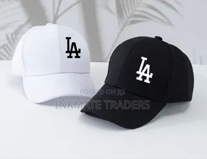 La White and Black Caps Available