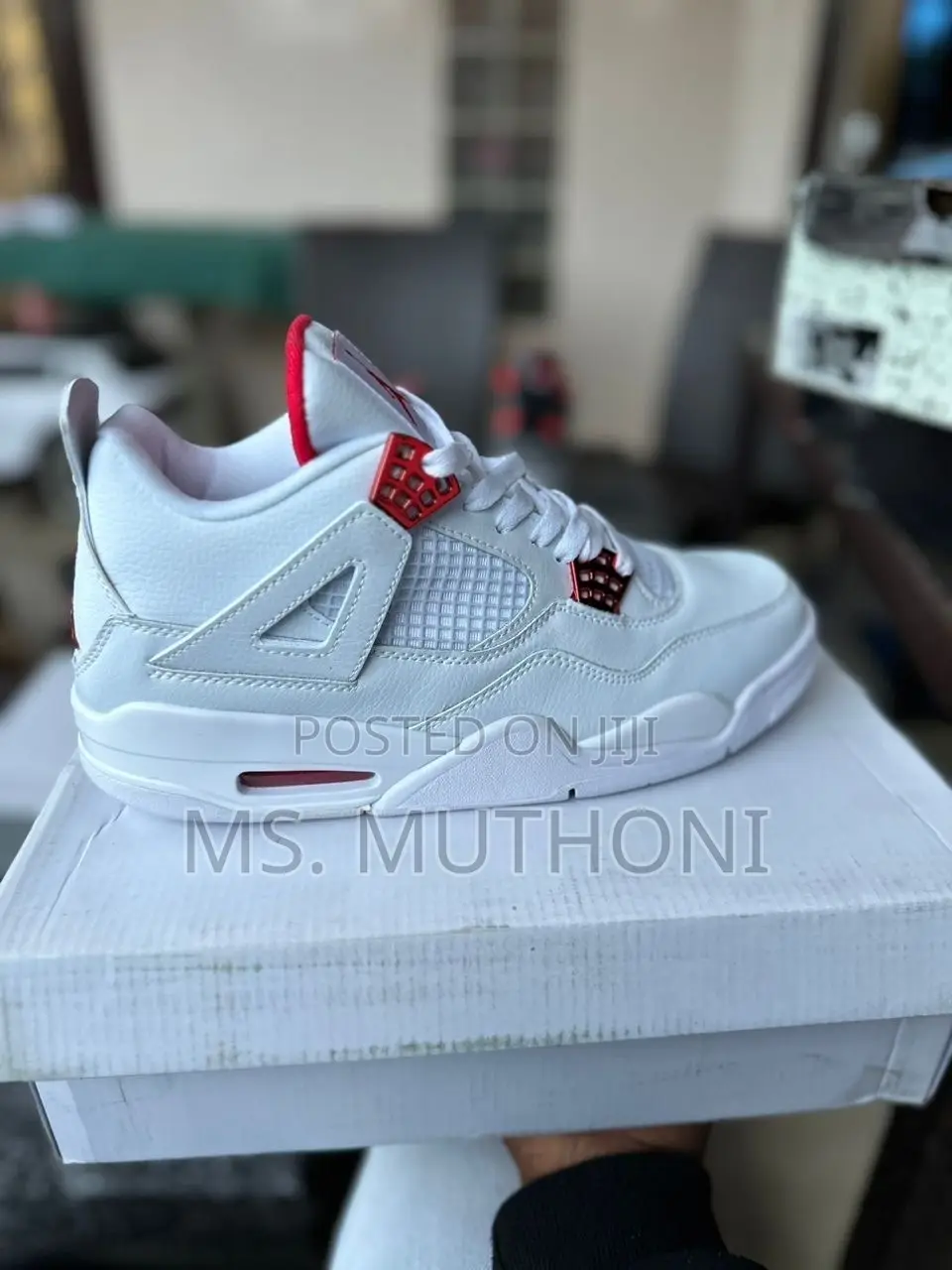 Brabd New Nike Air Jordan 4 Retro 'Red Metallic'.