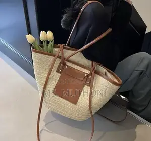 Straw Woven Beach Tote Bag With Leather Straps and a Front Pocket