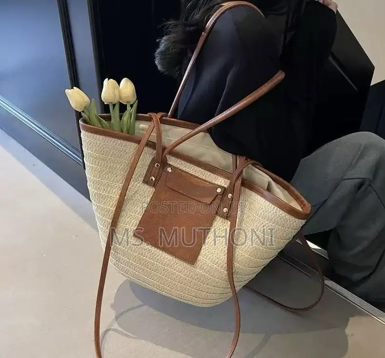 Straw Woven Beach Tote Bag With Leather Straps and a Front Pocket