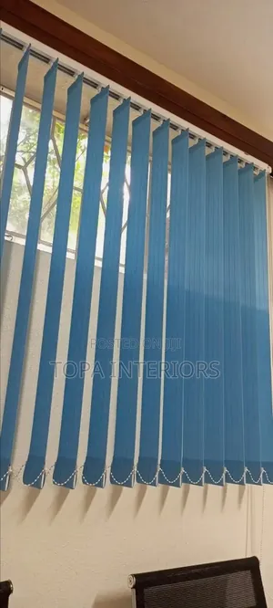 Light Blue Vertical Window Blinds That Act as Office Curtains