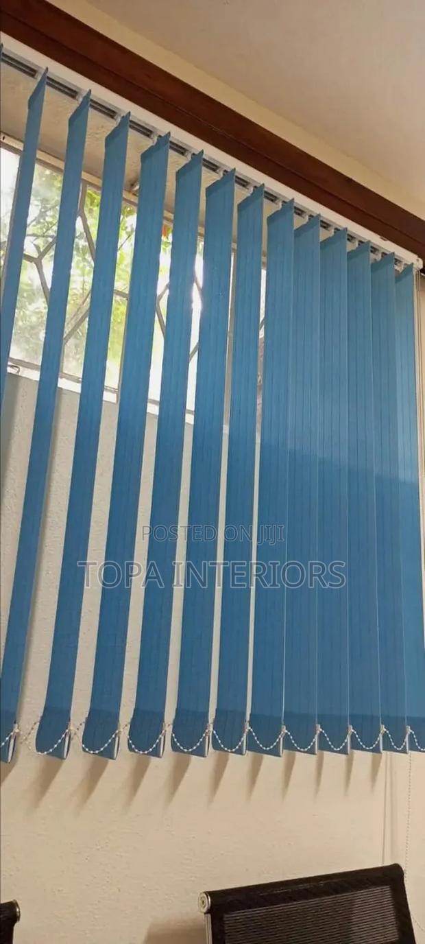 Light Blue Vertical Window Blinds That Act as Office Curtains