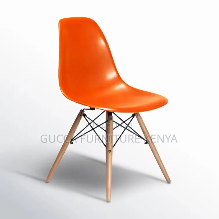 Orange Plastic Armless Eames Dining Chair