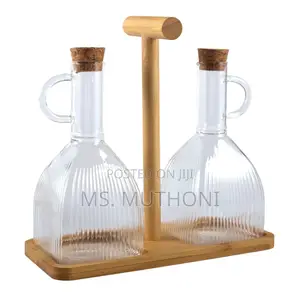 Two PCS Glass Oil and Vinegar Cruets on a Bamboo Stand
