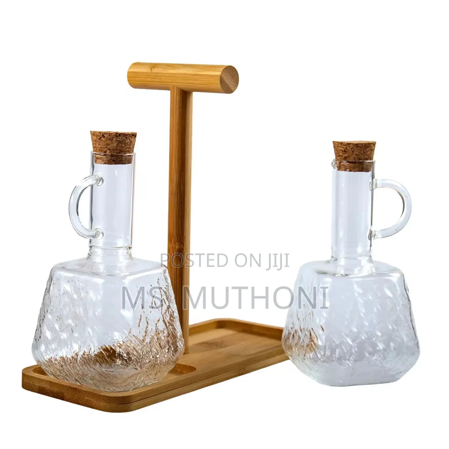 Two PCS Glass Oil and Vinegar Cruets on a Bamboo Stand