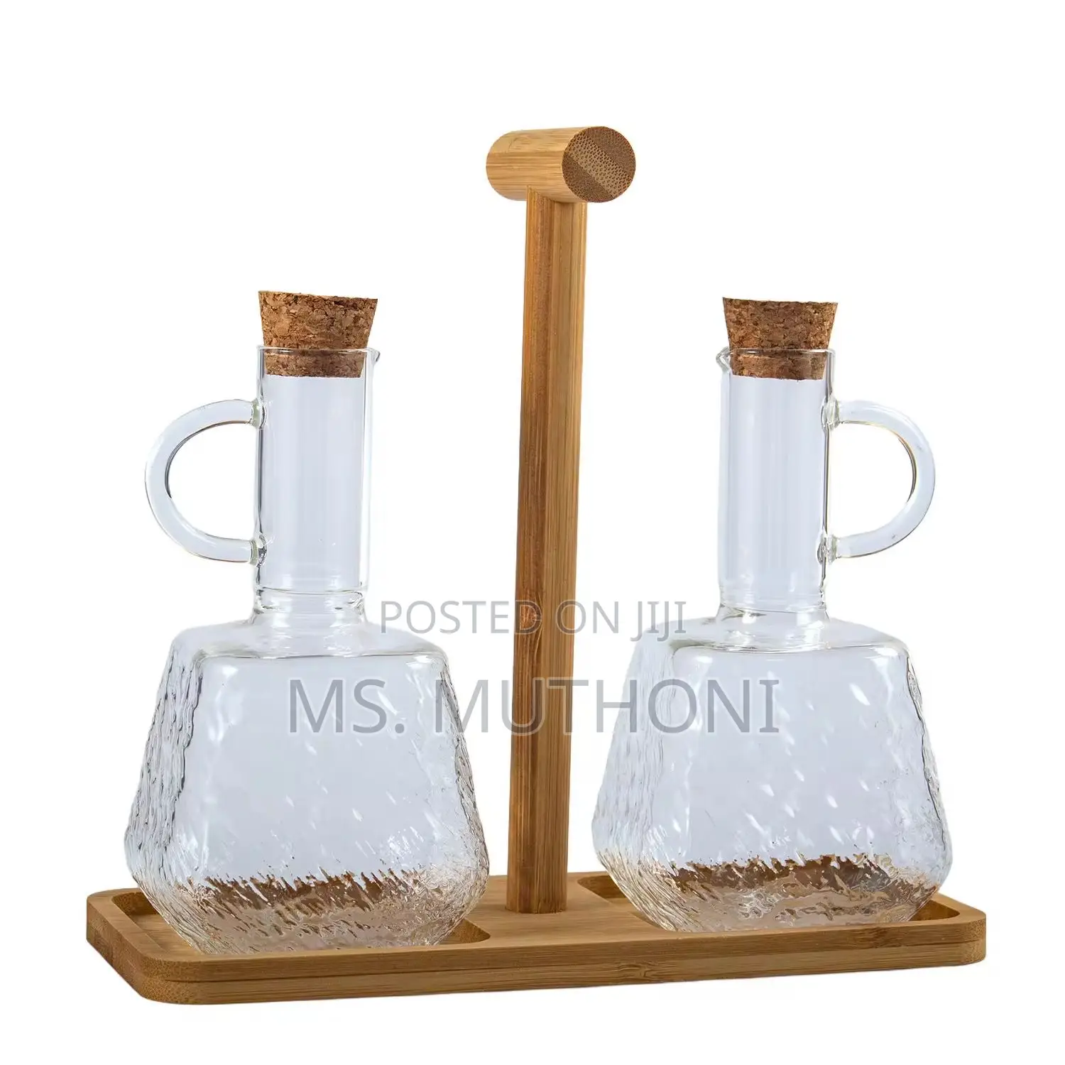 Two PCS Glass Oil and Vinegar Cruets on a Bamboo Stand