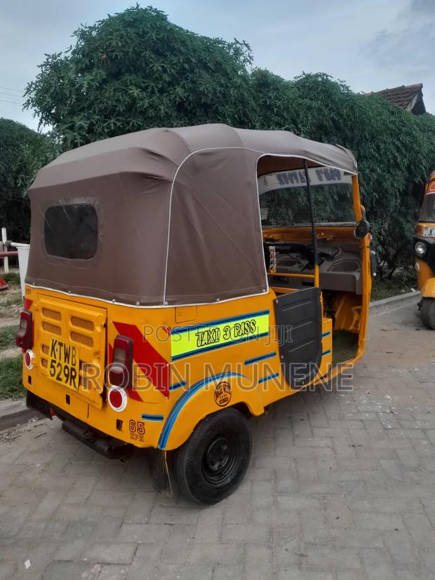 Bajaj RE 2021 Yellow - thumbnail 3