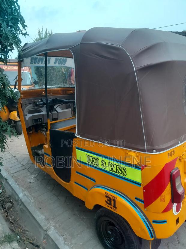 Bajaj RE 2021 Yellow - thumbnail 4