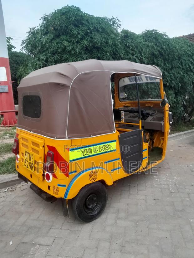 Bajaj RE 2021 Yellow - thumbnail 9