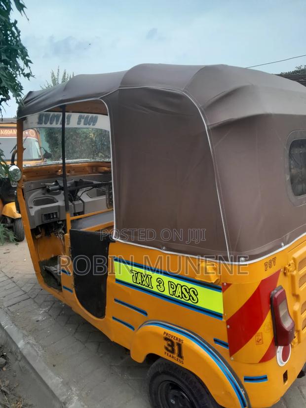 Bajaj RE 2021 Yellow - thumbnail 11