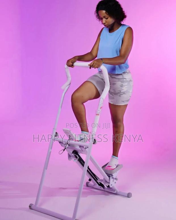 Vertical Stair Stepper Machine Used For Home Cardio Workouts.