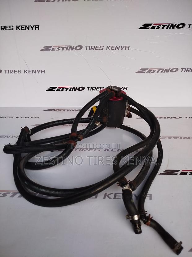 Subaru WRX/Sti Cobb Air Oil Separator With Hoses - main view