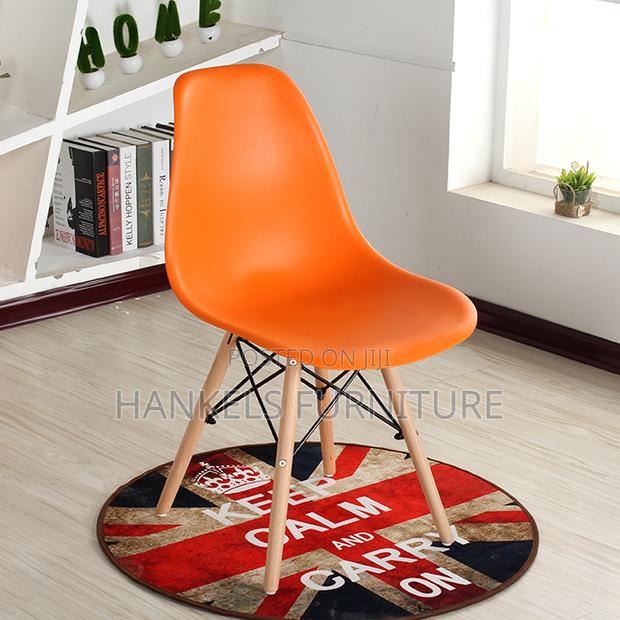 Orange Eames Plastic Bistro Chair - main view