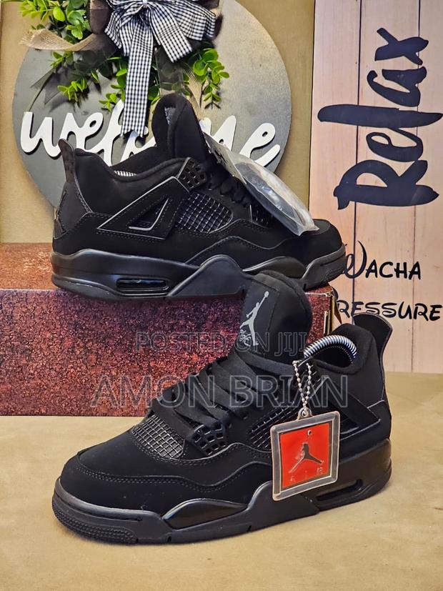 Black Jordans 4. - main view