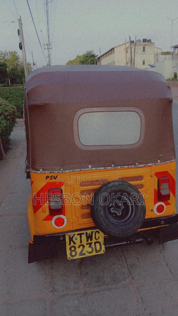 Bajaj RE 2018 Yellow - thumbnail 2