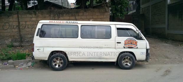 Nissan Caravan (Urvan) 2003 White - thumbnail 3