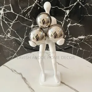 Decorative Human Figurine With Balls .