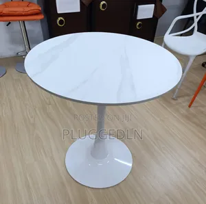 Marble Pedestal Dining Table.