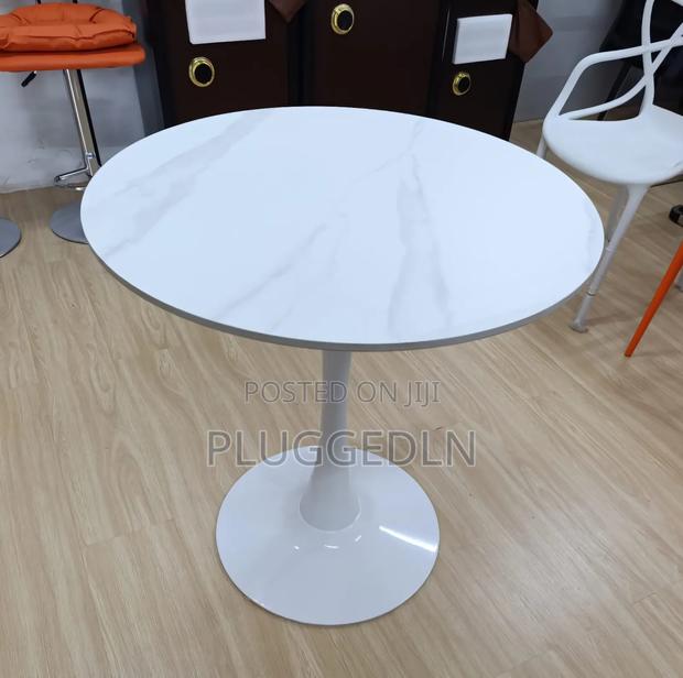 Marble Pedestal Dining Table.