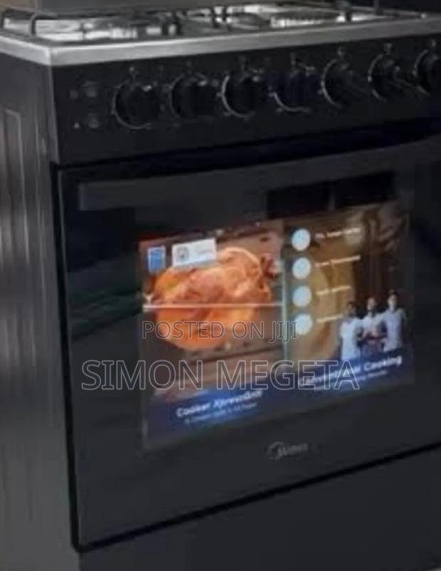 Midea Black 60×60 3 Gas + 1 Electric Cooker – Efficient Stylish.