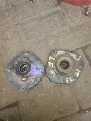 Front Starlet Shock Mounts.