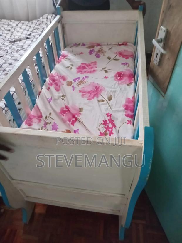 Blue and White Baby Crib - main view