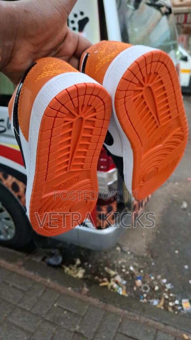 Jordan 1 Low Cut Orange Sneakers – Trendy Streetwear Shoes Kenya - thumbnail 3