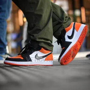 Jordan Low Cut Black Orange Sneakers – Trendy Shoes Kenya