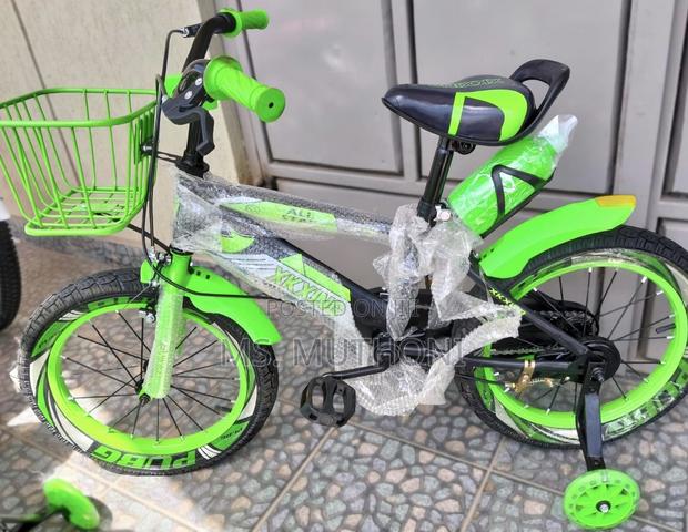 Green, (4-7 Yrs ) Children's Bike Training Wheels a Front Basket.
