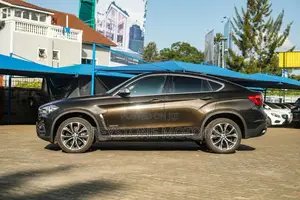 BMW X6 xDrive50i Coupe 4x4 (4.4L 8cyl 8A) 2016 Brown