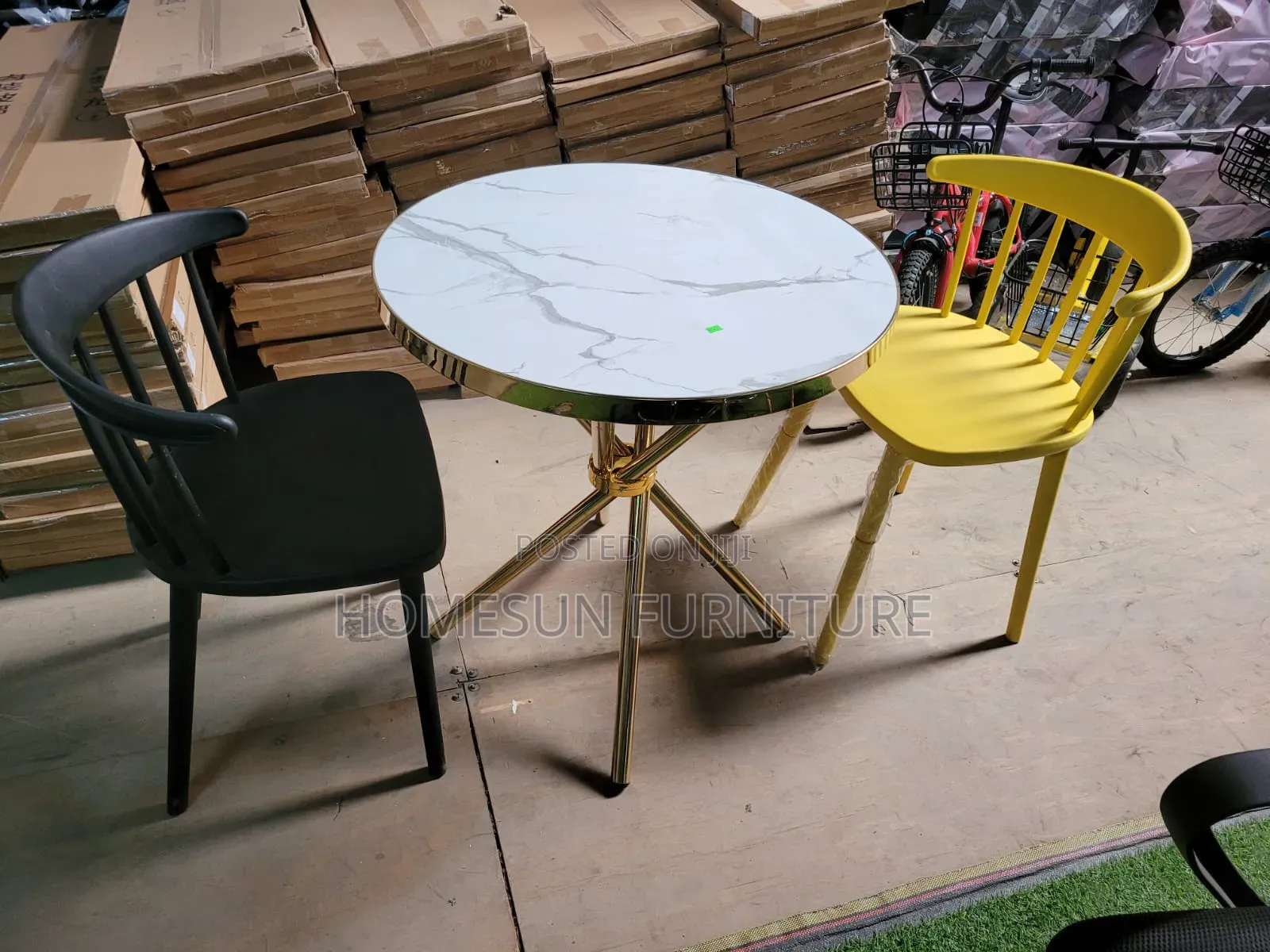 Round Dining Table and Plastic Chairs