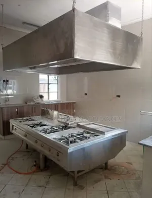 Full Kitchen Setup Hood And Combined Cooking Range