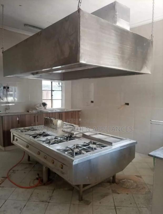Full Kitchen Setup Hood And Combined Cooking Range
