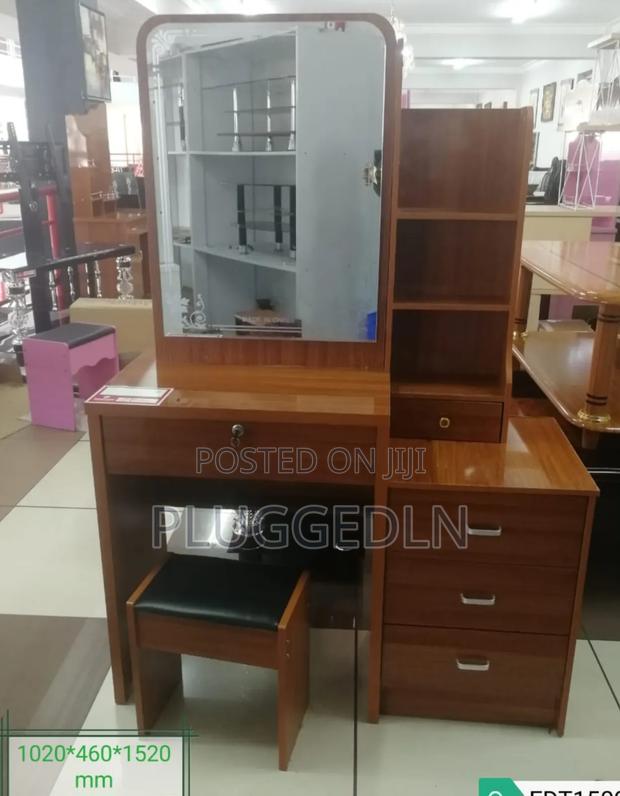 Brown Dressing Table With Sliding Mirror .