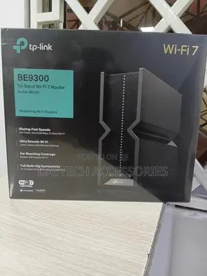 The Tp-Link Archer Be550 Be9300 Tri-Band Wi-Fi 7 Router.
