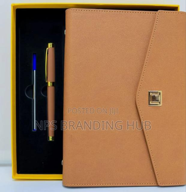 Executive Gift Set a Leather Notebook a Matching Pen.