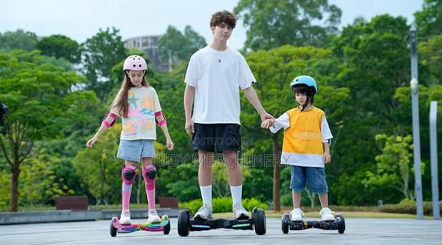 6.5"Hoover Board= Rechargeable, Bluetooth Connectivity, Led Lights