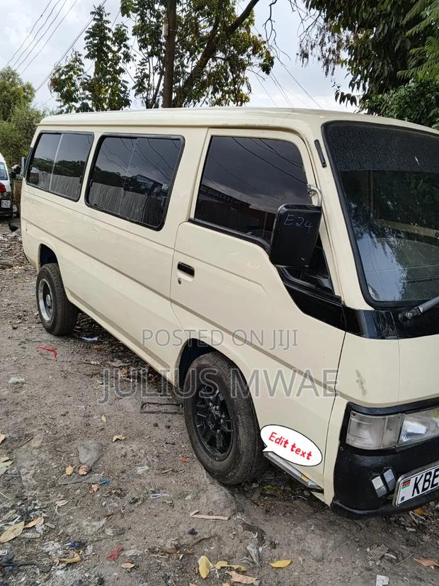 Nissan Caravan (Urvan) 2013 Beige - thumbnail 2
