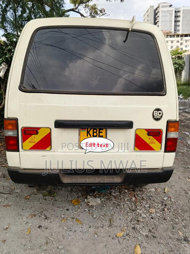 Nissan Caravan (Urvan) 2013 Beige - thumbnail 3