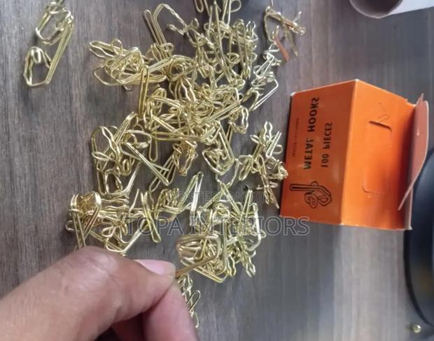 Gold Metal Curtain Hooks for Drapery Installation