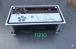 Stylish Modern Glass Coffee Table With Floral Design