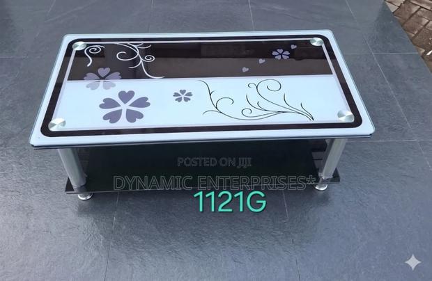Stylish Modern Glass Coffee Table With Floral Design