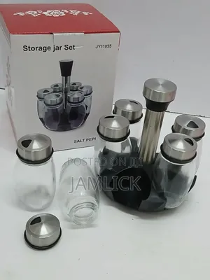 7-in-1 Rotating Kitchen Spice Bottle Set – Glass With Metallic Lid –Bz