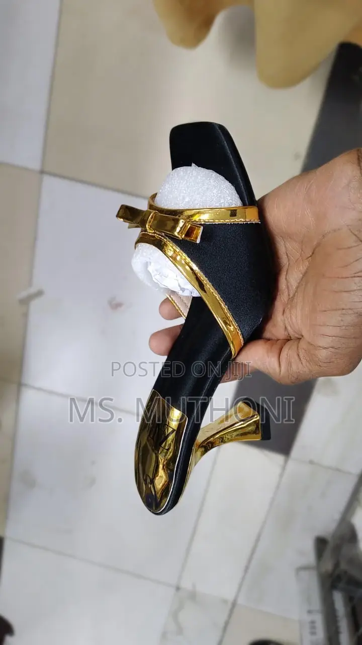 Gold Slip-on Heels Feature a Square-Toe Design 37-41